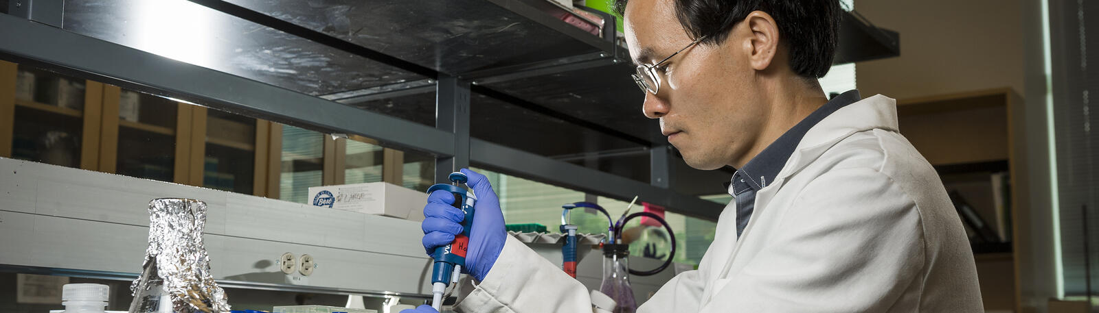 photo of a professor working in a lab